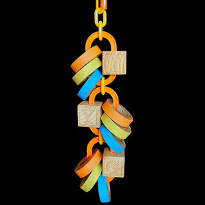 A refillable toy made with giant chain links, chubby birdie bagels and wooden ABC blocks. Once the bagels are gone, simply refill with more!  Hangs approx 11" including link.