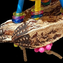 Load image into Gallery viewer, Handmade bird toy for small parrots made with a colorful bamboo basket, mahogany pods, paper straws and beads.