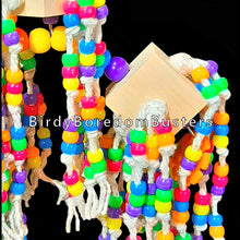 Load image into Gallery viewer, Just under 500 pony beads knotted on cotton from pine wood blocks on stainless steel wire that spin, wiggle and jiggle! Topped off with a mini plastic nut & bolt set for more interactive fun. Our experience has shown bead toys help feather pickers and are a great starter for birds that don't know how to play with toys. Measures approx 7" by 14" including link.