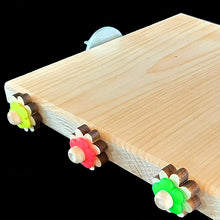 Load image into Gallery viewer, Untreated pine wood platform corner perch with spinning daisies measuring 7" by 7" by 3/4" thick. A great alternative perching spot for birds with special needs or just a different place for resting tired feet! Many birds will also enjoy chewing on the wood, providing hours of entertainment and beak exercise.