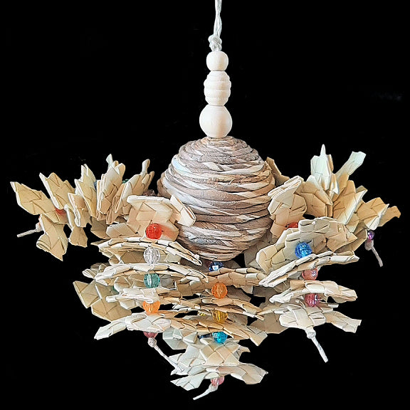 Eight strands of hemp cord filled with crunchy palm leaf shredders and crystal beads on a sola rope ball center. Designed for small to intermediate sized birds.  Measures approx 9