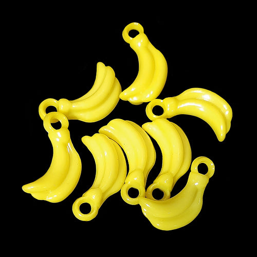 Yellow acrylic charms in the shape of a banana measuring approx 1/4