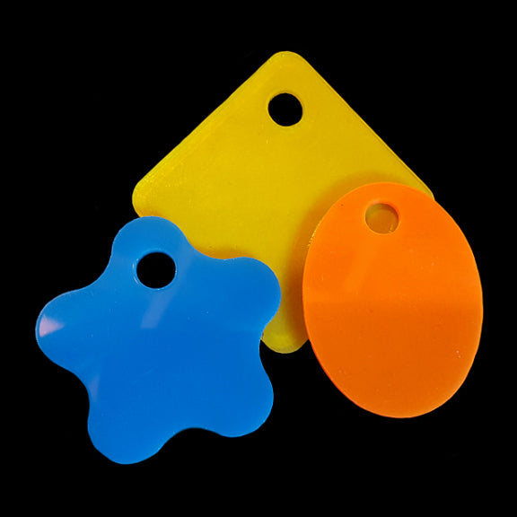 Thick acrylic toy tags in assorted colors and shapes measuring approx 2