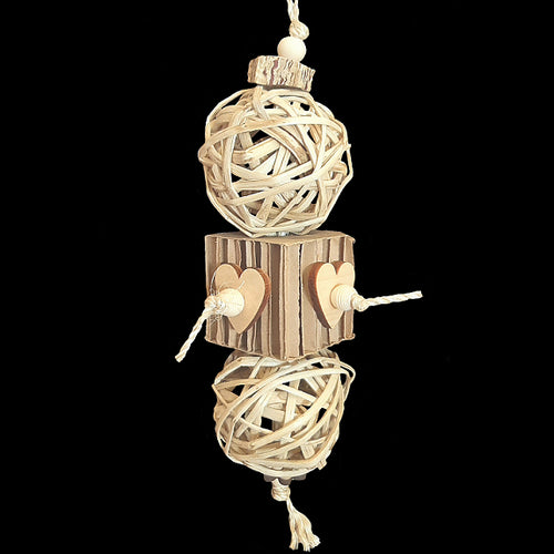 Two giant bamboo balls with a corrugated paper honeycomb cube strung on sisal rope. Natural pine hearts, wood beads and a mahogany pod slice add extra texture for more chewing pleasure. Designed for birds as well as bunnies!  Measures approx 4