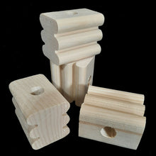 Load image into Gallery viewer, Natural, uncolored pine wood blocks measuring approx 1-1/2&quot; by 2&quot; by 1-5/8&quot; high with a 1/2&quot; hole. The blocks have rounded grooves making them easier for birds to chew.
