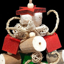 Load image into Gallery viewer, This Christmas bird toy is yucca with balsa cubes, sola chunks, vine stars, munch balls, seagrass cord, braided seagrass strips and little wood snap beads. 
