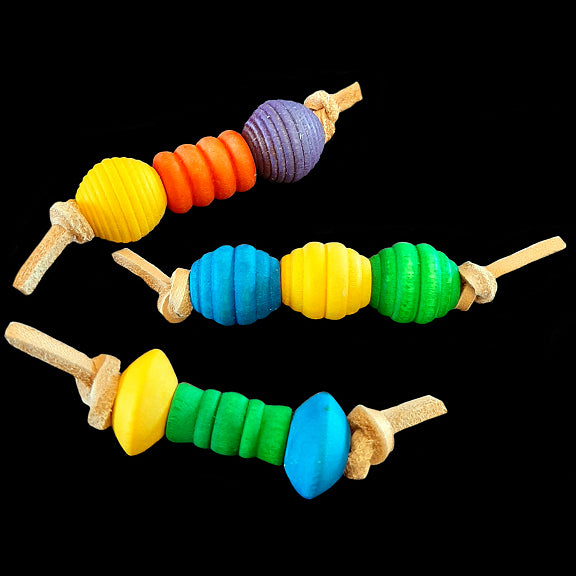 An assortment of small, lightweight foot toys made with colored wood beads strung on veggie tanned leather lace. Designed for small to intermediate birds. Approx 3-1/2