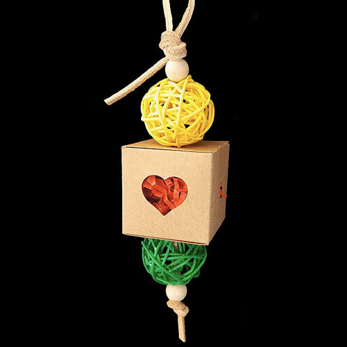 Crinkle-cut paper shred stuffed into a bird-safe craft paper box with brightly colored vine balls and wood beads strung on veggie tanned leather lace. Stuff small seeds, nuts or treats inside to entice and encourage your bird to start foraging! Designed for small-sized birds.  Measures approx 2