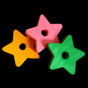 Brightly colored hardwood stars measuring 1-1/2" by 3/16" thick with a 1/4" hole drilled in the center.