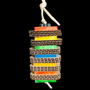 2" by 3" cardboard slices with brightly colored softwood slats stacked on paper twist rope. A perfect combination of paper shredding & wood chipping fun! Contains no metal parts.