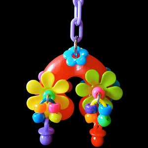 Spinning flowers, pony beads and mini pacifiers on a puffy plastic horseshoe hanging on plastic chain.  Hangs approx 6" including link.