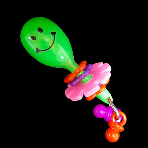 A light weight foot toy made with a mini plastic maraca with pacifier dangles, flower rings and a spinning daisy wheel. Designed for small to intermediate sized birds who are gentle with their toys. Available in assorted color combinations.  Measures approx 1-1/4" by 3-1/2".