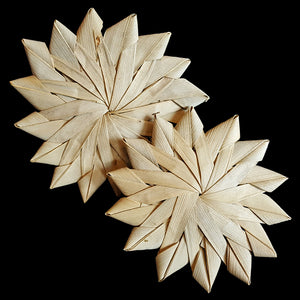 All natural, large palm leaf flowers. Each flower has a small hole in the center to make it easy to thread for hanging. Available in 2 sizes.