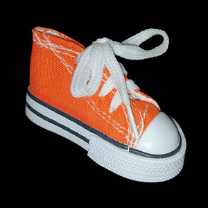 Totally adorable! Mini sneakers that measure approx 1-1/2" by 3" made from canvas & rubber with real shoelaces. Fill them with shredded paper & your bird's favorite treats to make an easy foraging toy.