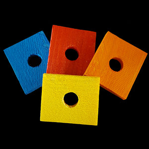 Brightly colored, thin pine slices measuring 1-1/2" by 1-3/4" by 1/4" thick with a 1/2" hole. An excellent choice for small and mid-size birds that aren't big chewers. Also great for bunny & chinchilla toys.