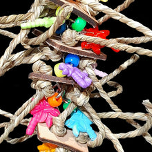 Load image into Gallery viewer, Four layers of veggie tanned leather squares knotted with crunchy seagrass cord, charms and pony beads strung on nickel plated chain.

