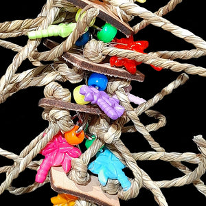 Four layers of veggie tanned leather squares knotted with crunchy seagrass cord, charms and pony beads strung on nickel plated chain.