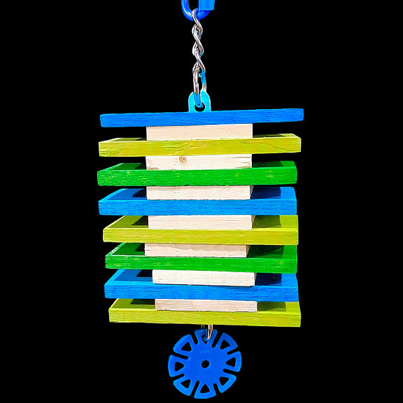 A combination of large softwood slats and pine chippers threaded on a plastic craft stick base. This toy can easily be refilled by simply opening one of the o-rings and sliding more wood onto the base. Available in assorted colors.  Measures approx 3-1/2
