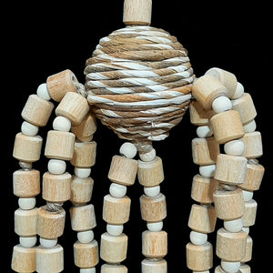 Lots of natural wood beads in different sizes to chew and snap! The base is a sola rope ball and is strung with jute cord. Designed for intermediate to medium sized birds such as caiques, senegals and quakers up to small cockatoos and african greys.