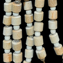 Load image into Gallery viewer, Lots of natural wood beads in different sizes to chew and snap! The base is a sola rope ball and is strung with jute cord. Designed for intermediate to medium sized birds such as caiques, senegals and quakers up to small cockatoos and african greys.
