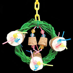 A four inch vine ring wreath adorned with super soft sola coins, small cork stoppers and little beads strung on plastic lacing cord. Hangs from a length of plastic chain. Designed for small birds such as budgies, parrotlets, lovebirds, linnies, etc.  Measures approx 4" by 7" including link.