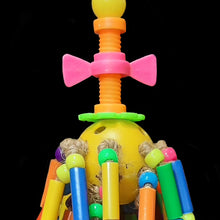 Load image into Gallery viewer, Colorful parrot toy with plastic straw beads and bright pony beads tied with jute cord on a perforated plastic golf ball.
