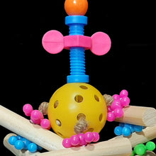 Load image into Gallery viewer, A fun bird toy designed for small parrots to chew and bop around! Natural 2-1/2" wood dowels and mini atom beads strung on jute cord from a plastic golf ball center. Topped off with a spinning mini nut and bolt.
