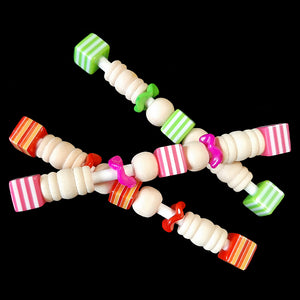 Light-weight foot toys made for the little guys with wood beads, wiggle rings and acrylic allsort beads on a rolled paper lollipop stick. Designed for small conures, cockatiels, quaker parakeets and other like-sized birds that enjoy handheld toys. Each toy measures approx 3-1/2" long.   Package contains 3 toys in assorted color combinations.