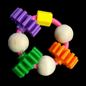 Large nubby plastic gears & hardwood balls on a strong plastic ring. Designed for medium to large parrots. One of our top selling, long lasting foot toys!  Measures approx 4".