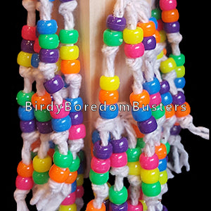 Over 300 pony beads knotted on cotton rope strands! The base is a 4" block topped with an InterStar ring & beads. Our experience has shown bead toys help feather pickers and are a great starter for birds that don't know how to play with toys.  Hangs approx 12" including link.
